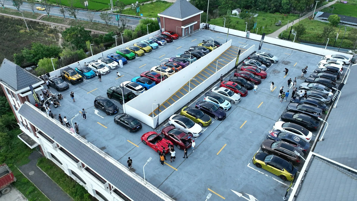 An aerial view of cars and event tents at the car trunk market — Car Trunk Market, China, 2022