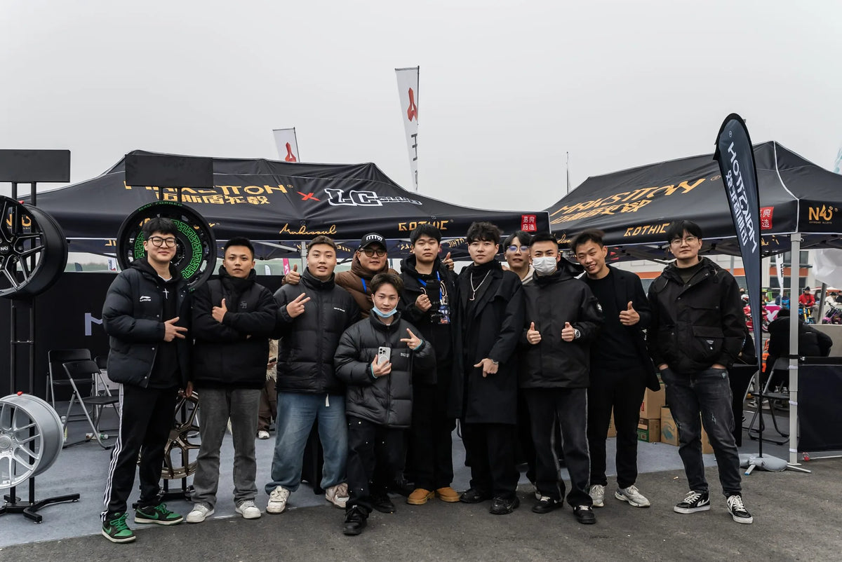 Car enthusiasts gathered by an event tent during Winter Night — Chengdu Tianfu · Winter Night, Sichuan, China, 2023