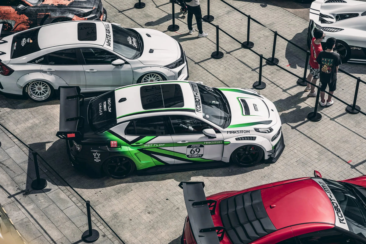Modified cars and exhibition visitors seen from above — Suzhou GT Show, Jiangsu, China, 2020